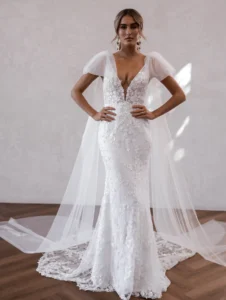 Model wearing Cameron with wings bridal gown by Made With Love bridal dresses (front closeup view)