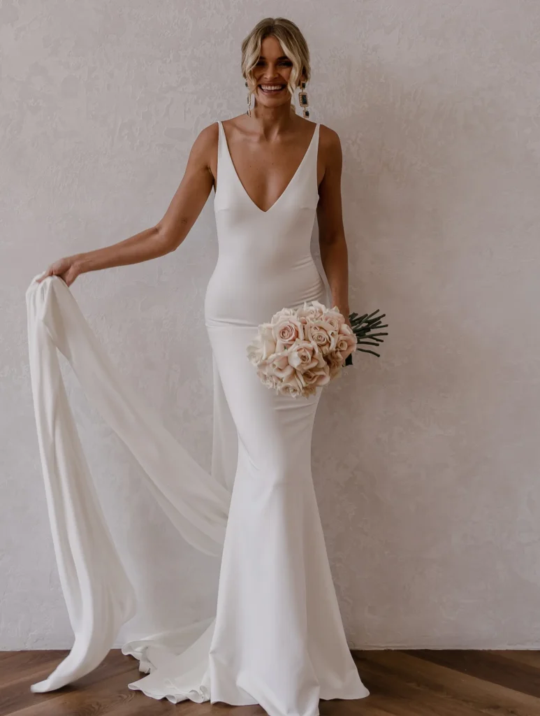 Harry wedding gown by Made With Love Bridal in Size 12 full front view of dress with train