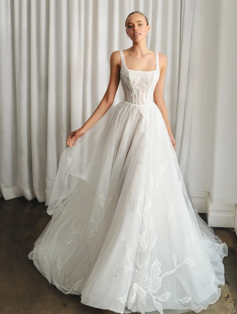 Model wearing the Kayla gown by La Premiere Bridal full front view