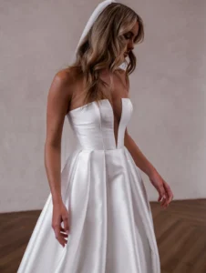 Model wearing Florence bridal gown by Made With Love bridal dresses (closeup front view)