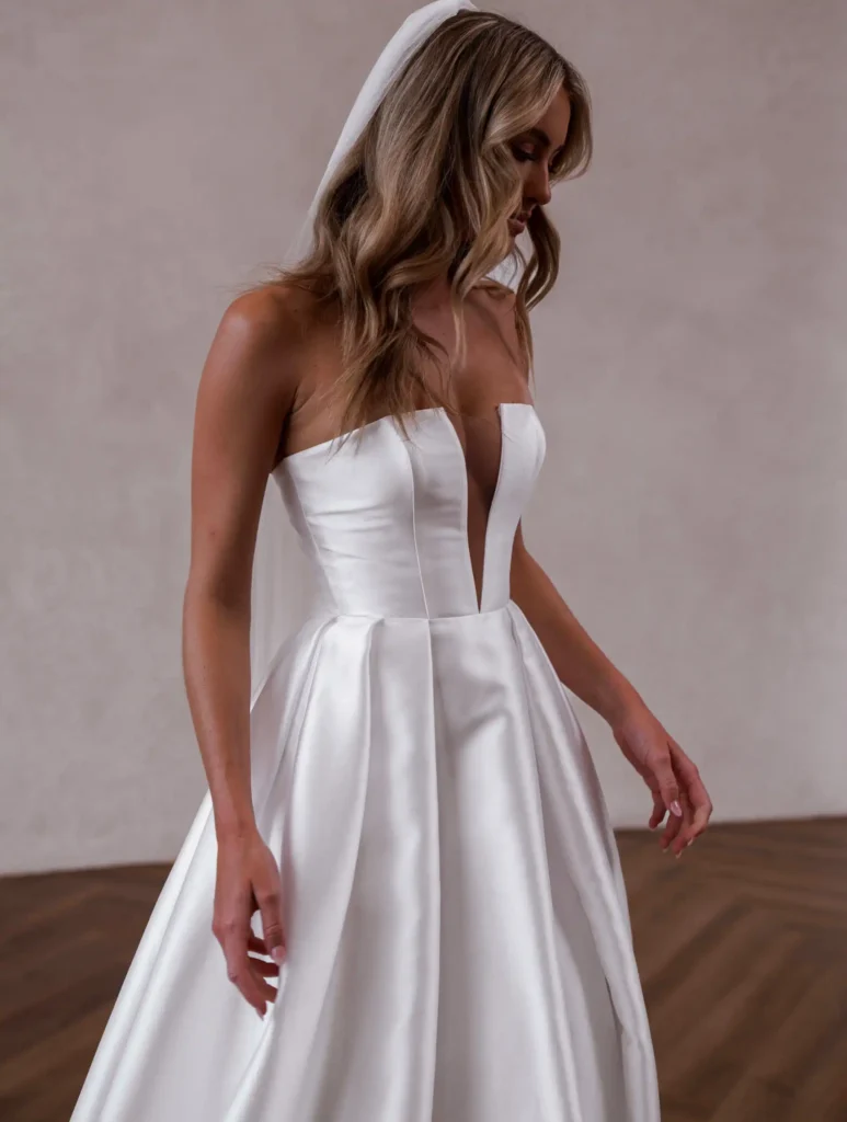 Model wearing Florence bridal gown by Made With Love bridal dresses (closeup front view)