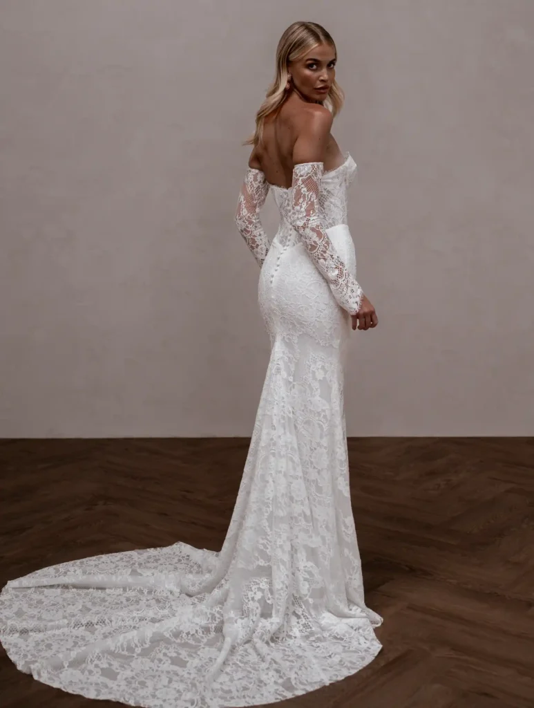 Model wearing Winnie wedding bridal gown by Made With Love bridal full back view dress