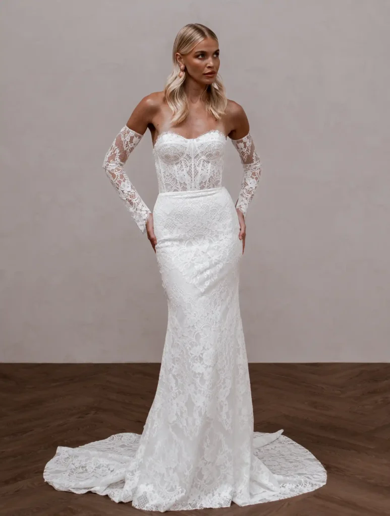 Model wearing Winnie wedding bridal gown by Made With Love bridal full front view dress