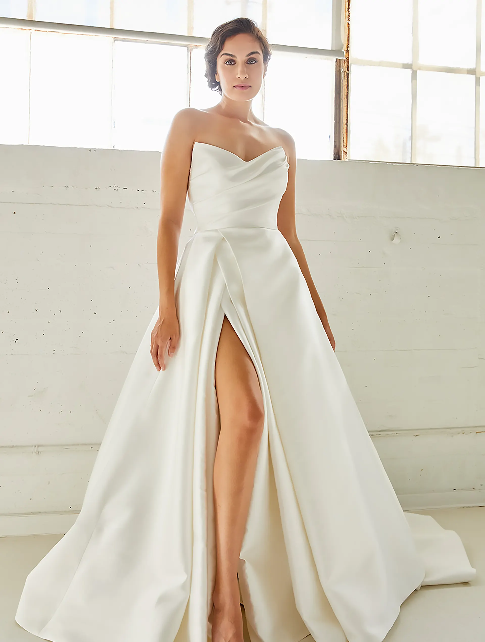 Model wearing the Arden bridal gown by Lea Ann Belter, full front view