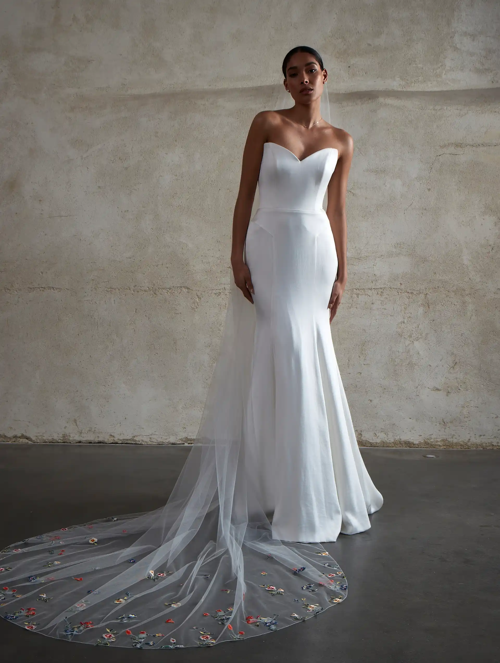 Model wearing the Nadia Gown by Sassi Holford Bridal Full Front View with floral lace train. Available in Size 14
